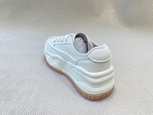 Women white espadrilles sneakers in summer autumn with authentic leather and casual