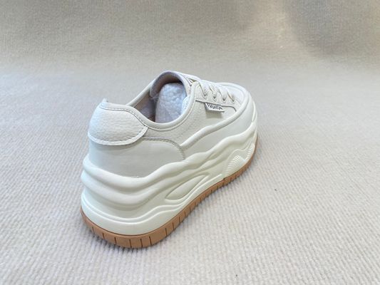 Women white espadrilles sneakers in summer autumn with authentic leather and casual