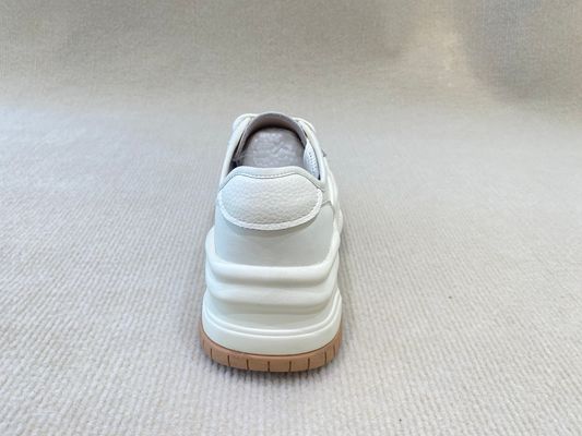 Women white espadrilles sneakers in summer autumn with authentic leather and casual