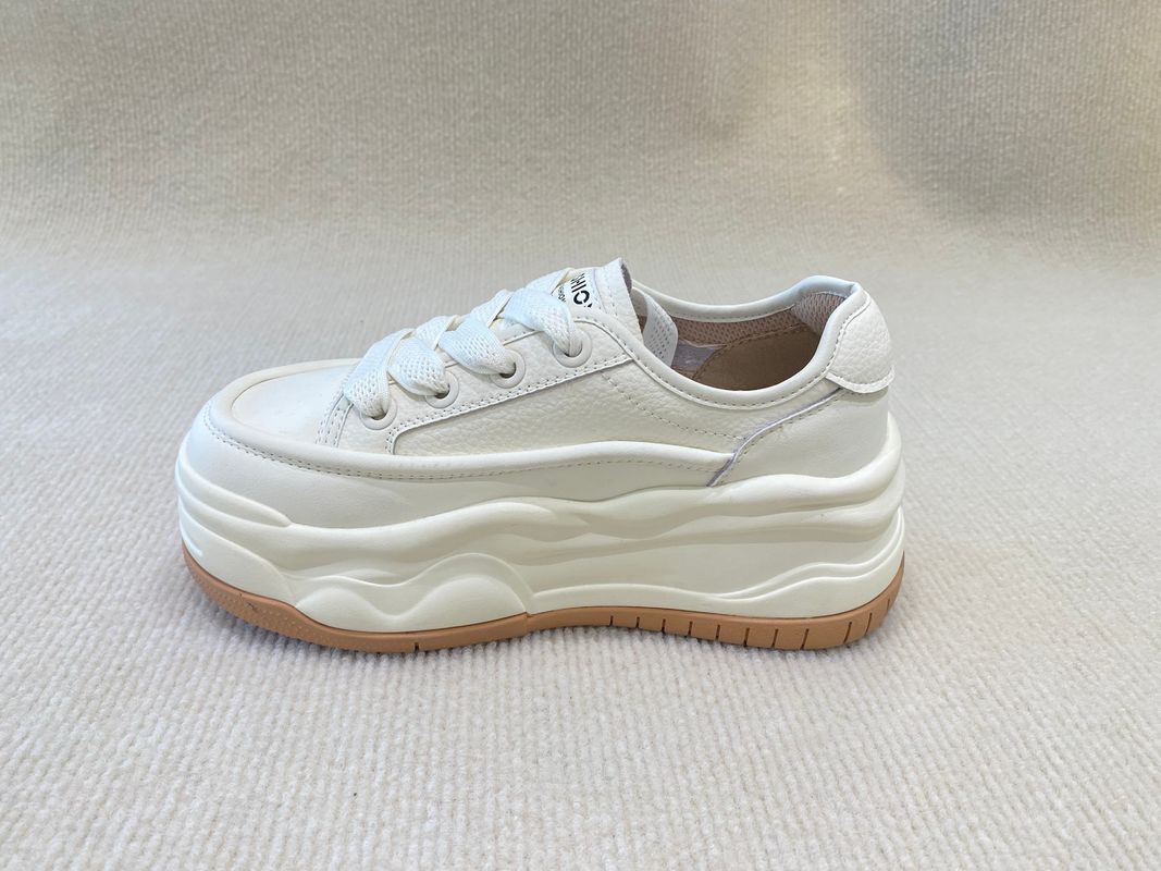 Women white espadrilles sneakers in summer autumn with authentic leather and casual